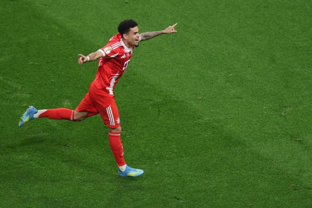 22 April 2026, North Rhine-Westphalia, Leverkusen: Bayern Munich's Luis Diaz celebrates scoring his side's second goal during the German DFB Cup semifinal soccer match between Bayer Leverkusen and Bayern Munich at BayArena. Photo: Rolf Vennenbernd/dpa - IMPORTANT NOTICE: DFL and DFB regulations prohibit any use of photographs as image sequences and/or quasi-video.