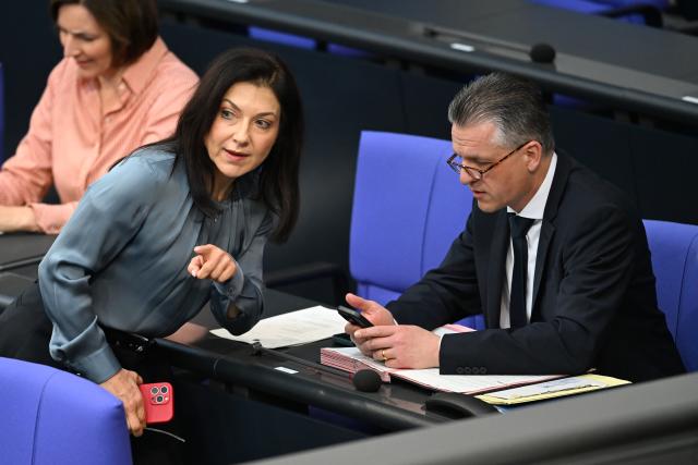 23 April 2026, Berlin: Katherina Reiche (C), German Minister for Economic Affairs and Energy, and Thorsten Frei (R), Head of the German Chancellery and Federal Minister for Special Tasks, take part in the Bundestag session. Another topic is the acceleration of the awarding of public contracts. Photo: Markus Lenhardt/dpa