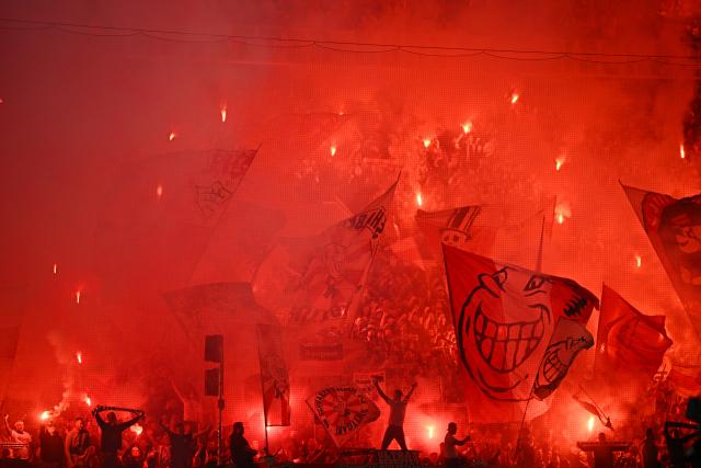 23 April 2026, Baden-Wuerttemberg, Stuttgart: Stuttgart fans set off pyrotechnics ahead of the German DFB Cup semifinal soccer match between VfB Stuttgart and SC Freiburg at MHPArena. Photo: Tom Weller/dpa - IMPORTANT NOTICE: DFL and DFB regulations prohibit any use of photographs as image sequences and/or quasi-video.