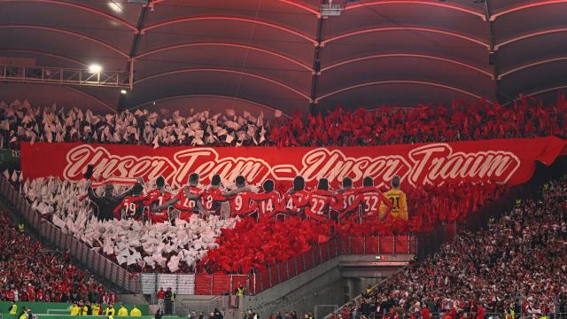 23 April 2026, Baden-Wuerttemberg, Stuttgart: Freiburg fans perform a choreographed display ahead of the German DFB Cup semifinal soccer match between VfB Stuttgart and SC Freiburg at MHPArena. Photo: Tom Weller/dpa - IMPORTANT NOTICE: DFL and DFB regulations prohibit any use of photographs as image sequences and/or quasi-video.