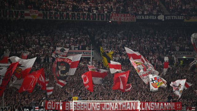 23 April 2026, Baden-Wuerttemberg, Stuttgart: Fans wave flags in the stands during the German DFB Cup semifinal soccer match between VfB Stuttgart and SC Freiburg at MHPArena. Photo: Tom Weller/dpa - IMPORTANT NOTICE: DFL and DFB regulations prohibit any use of photographs as image sequences and/or quasi-video.