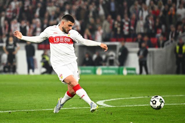 23 April 2026, Baden-Wuerttemberg, Stuttgart: Stuttgart's Deniz Undav scores his side's first goal of the game during the German DFB Cup semifinal soccer match between VfB Stuttgart and SC Freiburg at MHPArena. Photo: Tom Weller/dpa - IMPORTANT NOTICE: DFL and DFB regulations prohibit any use of photographs as image sequences and/or quasi-video.