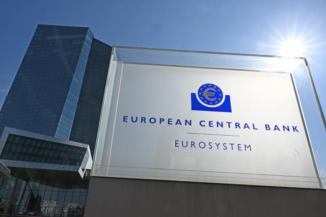 FILED - 19 March 2026, Hesse, Frankfurt_Main: A sign reading "European Central Bank - Eurosystem" stands in front of the European Central Bank (ECB) in Frankfurt. Photo: Michael Brandt/dpa