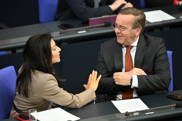 24 April 2026, Berlin: Katherina Reiche, German Minister for Economic Affairs and Energy, and Boris Pistorius, German Minister of Defense, speak during the plenary session of the German Parliament (Bundestag) in Berlin. Photo: Markus Lenhardt/dpa