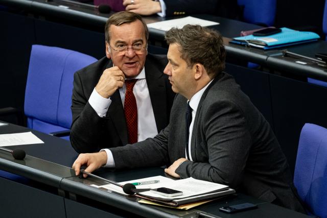 24 April 2026, Berlin: Boris Pistorius, German Minister of Defense, speaks to  Lars Klingbeil, German Minister of Finance, during the plenary session of the German Parliament (Bundestag) in Berlin. Photo: Fabian Sommer/dpa
