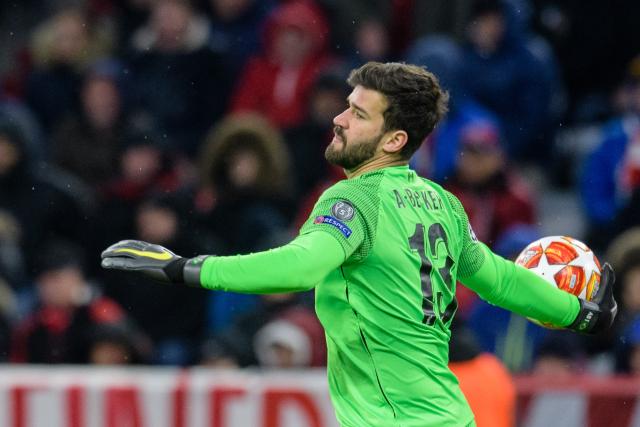 FILED - 13 March 2019, Bavaria, Munich: Liverpool goalkeeper Alisson Becker in action during the 2019 UEFA Champions League round of 16 second leg soccer match between Bayern Munich and Liverpool FC at the Allianz Arena. Photo: Matthias Balk/dpa