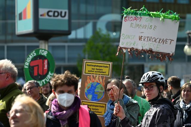 24 April 2026, Berlin: Protesters gather in front of the Christian Democratic Union (CDU) headquarters as part of the "Fridays for Future" campaign. Photo: Soeren Stache/dpa