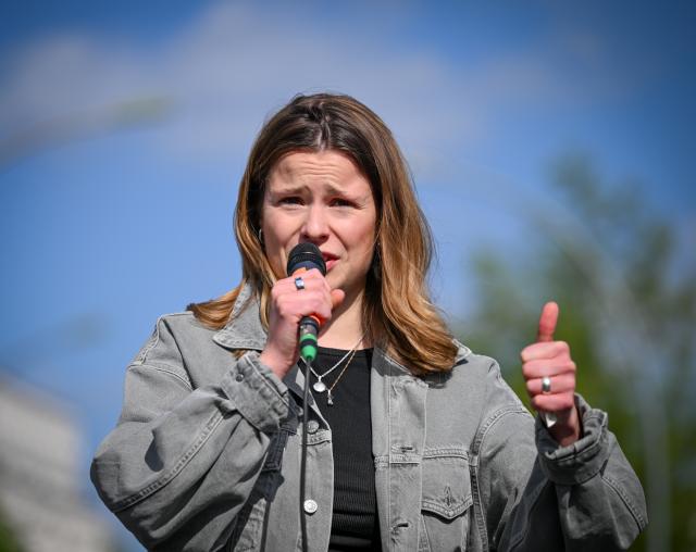 24 April 2026, Berlin: Luisa Neubauer, German climate activist and politician, speaks in front of the Christian Democratic Union (CDU) headquarters as part of the 'Fridays for Future' campaign. Photo: Soeren Stache/dpa