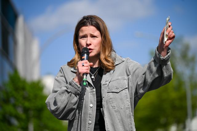 24 April 2026, Berlin: Luisa Neubauer, German climate activist and politician, speaks in front of the Christian Democratic Union (CDU) headquarters as part of the 'Fridays for Future' campaign. Photo: Soeren Stache/dpa