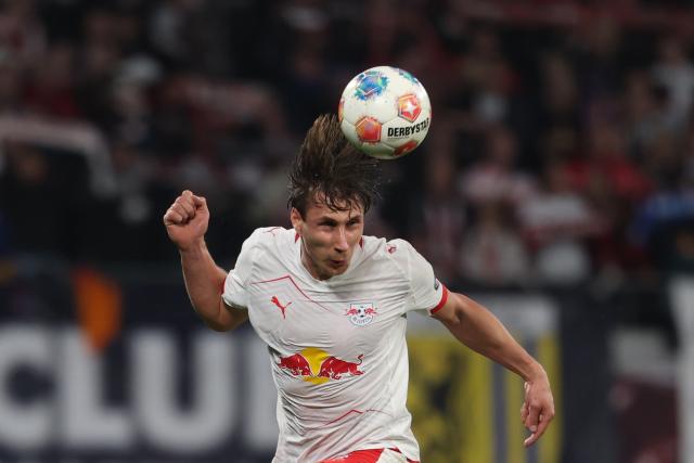 24 April 2026, Saxony, Leipzig: Leipzig's Willi Orban heads the ball during the German Bundesliga soccer match between RB Leipzig and 1. FC Union Berlin at Red Bull Arena. Photo: Jan Woitas/dpa - IMPORTANT NOTICE: DFL and DFB regulations prohibit any use of photographs as image sequences and/or quasi-video.
