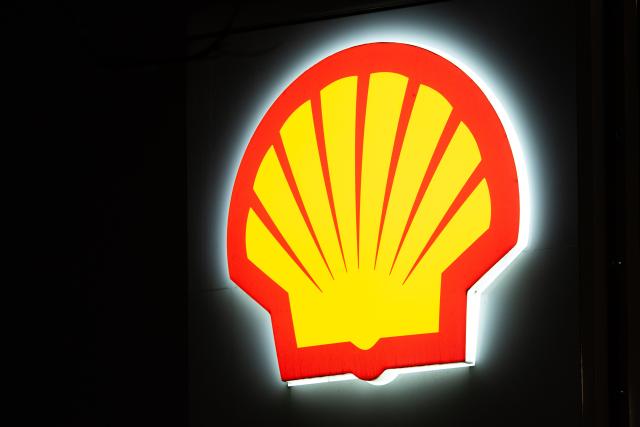 FILED - 11 November 2024, Berlin: A Shell logo at a gas station glows in the dark in Berlin. Photo: Hannes P Albert/dpa