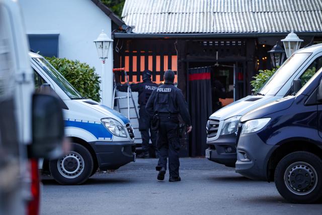 28 April 2026, North Rhine-Westphalia, Hilden: Police officers search the Hells Angels clubhouse in Hilden. Police in North Rhine-Westphalia carry out a large-scale raid against the rocker group. Photo: Christoph Reichwein/dpa