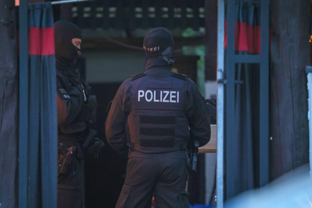 28 April 2026, North Rhine-Westphalia, Hilden: Police officers search the Hells Angels clubhouse in Hilden. Police in North Rhine-Westphalia carry out a large-scale raid against the rocker group. Photo: Christoph Reichwein/dpa