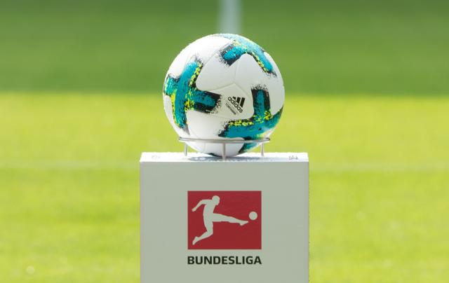 FILED - 27 August 2017, Saxony, Leipzig: The match ball is displayed on a pedestal before the German Bundesliga soccer match between RB Leipzig and SC Freiburg at the Red Bull Arena. The German Football League (DFL) will receive a loan of up to ·100 million ($117.3 million) from sports goods makers adidas in an effort to strengthen its media marketing efforts. Photo: Sebastian Kahnert/dpa