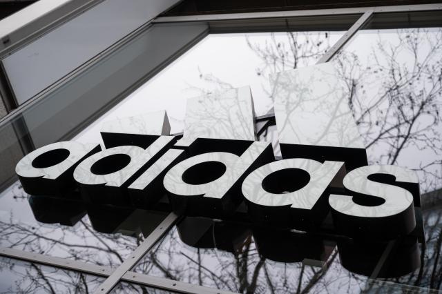 FILED - 12 April 2021, Berlin: The Adidas logo is pictured on the facade of a building in Berlin. Photo: Christophe Gateau/dpa