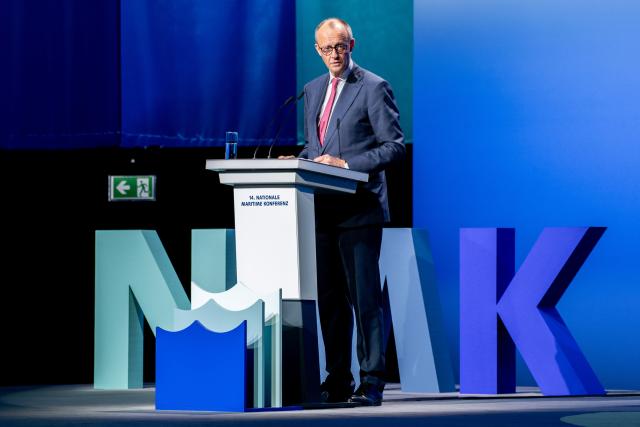 29 April 2026, Lower Saxony, Emden: German Chancellor Friedrich Merz speaks at the National Maritime Conference (NMK) in the Nordseehalle. Photo: Hauke-Christian Dittrich/dpa