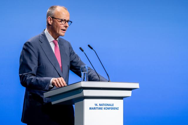 29 April 2026, Lower Saxony, Emden: German Chancellor Friedrich Merz speaks at the National Maritime Conference (NMK) in the Nordseehalle. Photo: Hauke-Christian Dittrich/dpa