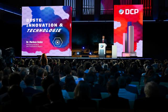 29 April 2026, Bavaria, Munich: Minister-President of Bavaria Markus Soeder takes the stage as the presenter at the German Computer Game Awards (DCP). Photo: Sven Hoppe/dpa