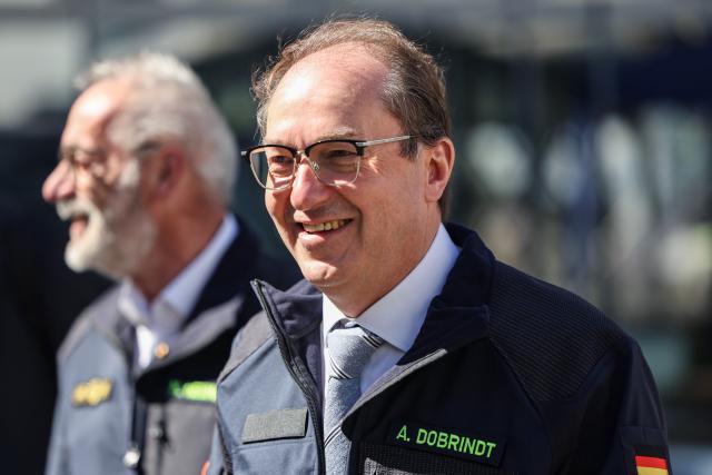 30 April 2026, North Rhine-Westphalia, Bonn: German Minister of the Interior Alexander Dobrindt walks through the grounds of the Federal Agency for Technical Relief (THW). The Federal Minister of the Interior visits the THW and the Federal Office of Civil Protection and Disaster Assistance (BBK). Photo: Oliver Berg/dpa