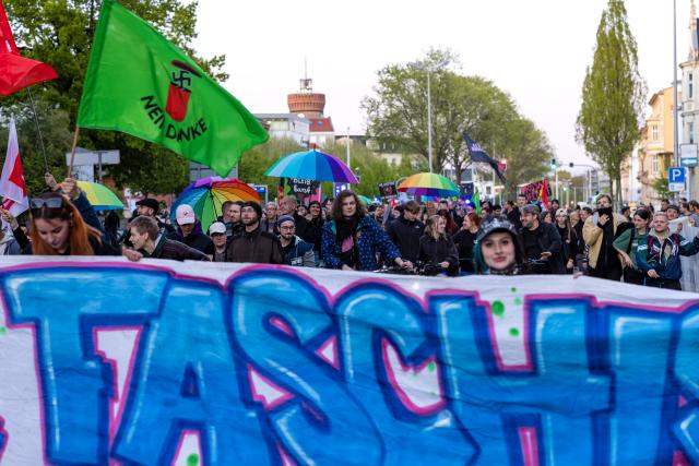 30 April 2026, Brandenburg, Cottbus: People take part in a demonstration against right-wing violence under the slogan "You attack us-we stand together". In recent days, there have been a series of far-right and anti-Semitic attacks in the city. Photo: Frank Hammerschmidt/dpa