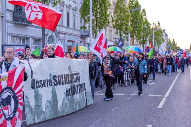 30 April 2026, Brandenburg, Cottbus: People take part in a demonstration against right-wing violence under the slogan "You attack us-we stand together". In recent days, there have been a series of far-right and anti-Semitic attacks in the city. Photo: Frank Hammerschmidt/dpa