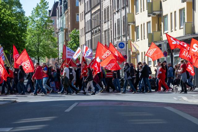 01 May 2026, Bavaria, Nuremberg: A demonstration with the slogan "First our jobs, then your profits" marches through the city. The occasion is a nationwide trade union rally to mark International Workers' Day. Photo: Pia Bayer/dpa