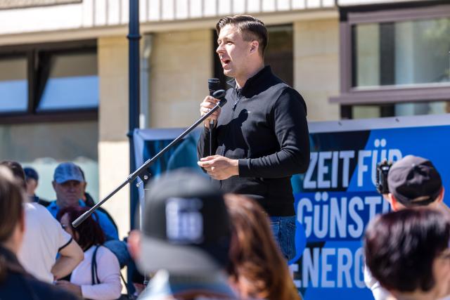 01 May 2026, Brandenburg, Cottbus: Jean Pascal Hohm (AfD), chairman of "Generation Deutschland", speaks at an AfD event on May Day. Several demonstrations and events are taking place across Germany and in the city on May 1. The Brandenburg AfD had called for a demonstration under the slogan "Fuel prices down - stop inflation!". Photo: Frank Hammerschmidt/dpa