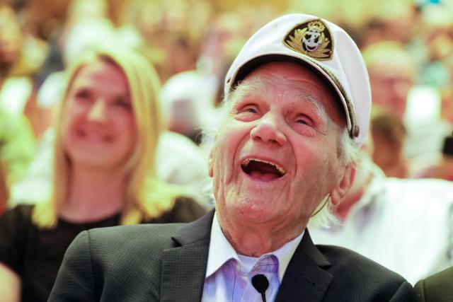 01 May 2026, Thuringia, Weimar: Buchenwald survivor Andrei Ivanovich Moiseenko sits at the celebration of his 100th birthday at the German National Theater. Photo: Bodo Schackow/dpa