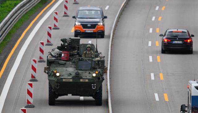 FILED - 24 May 2023, Saxony, Dresden: FILE PHOTO - A US military vehicle drives along the A4 highway near Dresden in the morning. Photo: Robert Michael/dpa