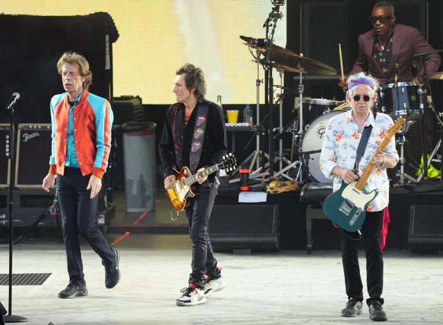 FILED - 03 August 2022, Berlin: FILE PHOTO - (L-R) English musicians Mick Jagger, Ron Wood and Keith Richards of the British band The Rolling Stones during the anniversary tour "Sixty" at the beginning of the concert at the Waldbuehne in Berlin. Photo: Soeren Stache/dpa