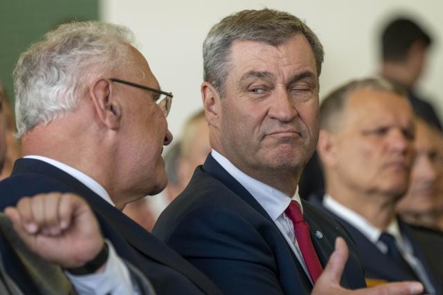 04 May 2026, Bavaria, Erding: Joachim Herrmann, (L) Bavarian Minister of the Interior, for Sport and Integration, and Markus Soeder (R), Prime Minister of Bavaria, attend the opening of the Drone Competence and Defense Center. Photo: Peter Kneffel/dpa