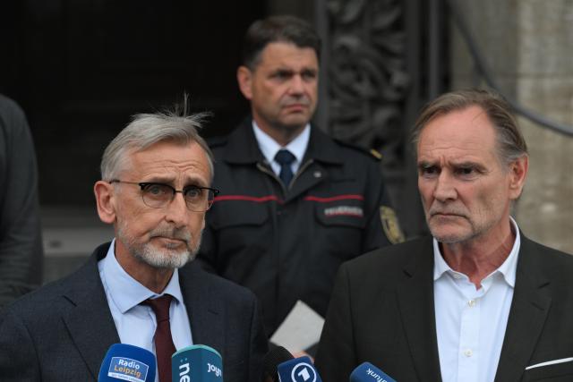 04 May 2026, Saxony, Leipzig: Burkhard Jung (R), Mayor of Leipzig, and Armin Schuster , Leipzig's Minister of the Interior of Saxony, make a statement, after a car crashes into a group of people in Leipzig. Photo: Hendrik Schmidt/dpa