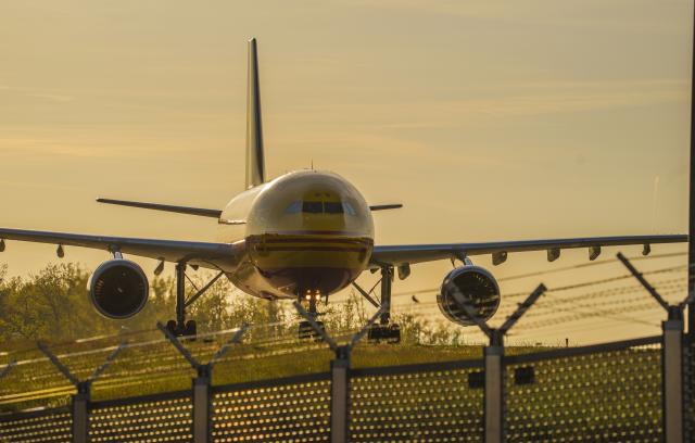 FILED - 24 April 2026, Hesse, Frankfurt/Main: A DHL air freight plane cabs along the taxiway to the terminal at Frankfurt Airport. Photo: Andreas Arnold/dpa