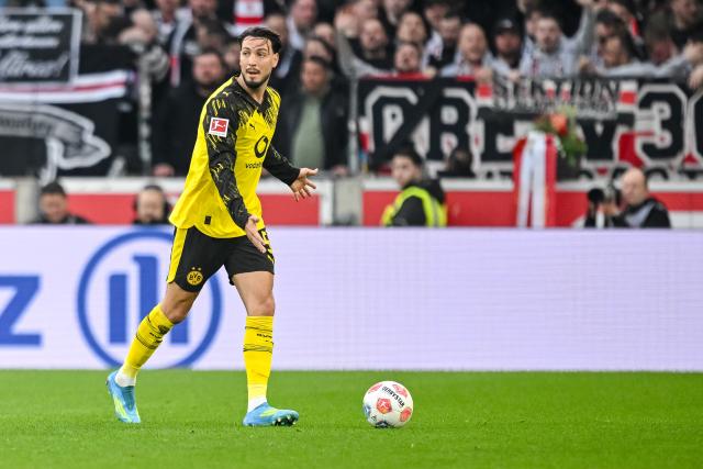 FILED - 04 April 2026, Baden-Wuerttemberg, Stuttgart: Borussia Dortmund's Ramy Bensebaini in action during the German Bundesliga soccer match between VfB Stuttgart and Borussia Dortmund at MHPArena. Photo: Harry Langer/dpa