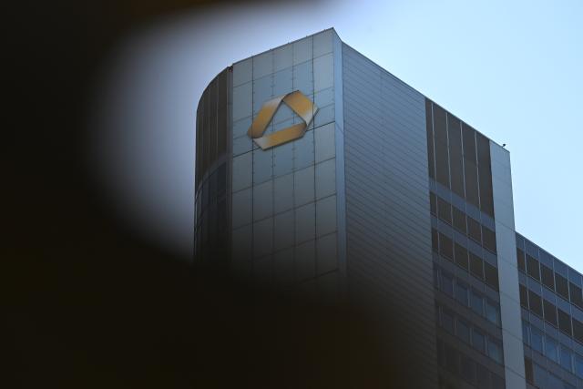 FILED - 16 March 2026, Hesse, Frankfurt/Main: The bank's logo hangs on the Commerzbank Tower in Frankfurt. Photo: Michael Brandt/dpa