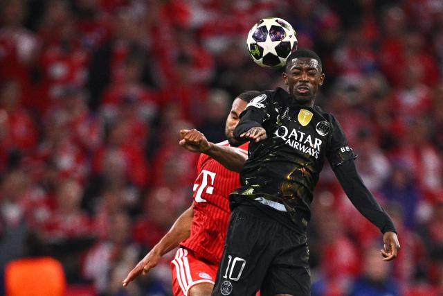 06 May 2026, Bavaria, Munich: Bayern Munich's Jonathan Tah and Paris Saint-Germain's Ousmane Dembele (R) battle for a header during the UEFA Champions League semi-final, second leg soccer match between Bayern Munich and Paris Saint-Germain at the Allianz Arena. Photo: Tom Weller/dpa