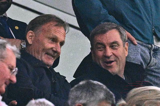 06 May 2026, Bavaria, Munich: BVB President Hans-Joachim Watzke and Markus Soeder (R), Minister President of Bavaria, attend the UEFA Champions League semi-final, second leg soccer match between Bayern Munich and Paris Saint-Germain at the Allianz Arena. Photo: Tom Weller/dpa