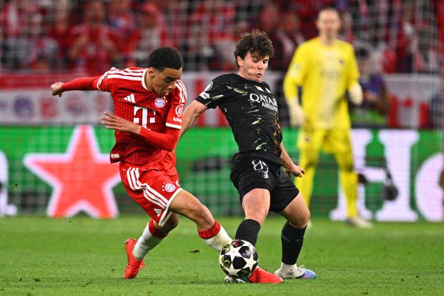 06 May 2026, Bavaria, Munich: Bayern Munich's Jamal Musiala and Paris Saint-Germain's Joao Neves in action during the UEFA Champions League semi-final, second leg soccer match between Bayern Munich and Paris Saint-Germain at the Allianz Arena. Photo: Tom Weller/dpa