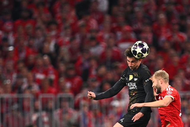 06 May 2026, Bavaria, Munich: Paris Saint-Germain's Fabian Ruiz and Bayern Munich's Konrad Laimer battle for the ball during the UEFA Champions League semi-final, second leg soccer match between Bayern Munich and Paris Saint-Germain at the Allianz Arena. Photo: Tom Weller/dpa