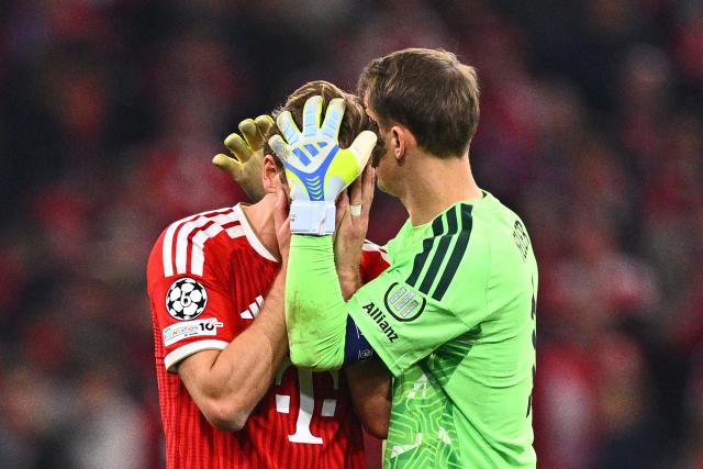 06 May 2026, Bavaria, Munich: Bayern Munich goalkeeper Manuel Neuer consoles Harry Kane after their defeat in the UEFA Champions League semi-final, second leg soccer match between Bayern Munich and Paris Saint-Germain at the Allianz Arena. Photo: Tom Weller/dpa