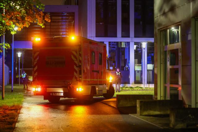 06 May 2026, Duesseldorf: An ambulance carrying a German patient who has been evacuated from the hantavirus-hit cruise ship MV Hondius, to the infection center at Duesseldorf University Hospital. Photo: Christoph Reichwein/dpa