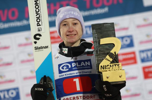 FILED - 01 January 2026, Bavaria, Oberstdorf: Slovenia's Nika Prevc celebrates during the overall award ceremony after finishing first in the Ski Jumping Women's Large Hill competition at the Nordic Skiing World Cup Two-Nights Tour. Photo: Karl-Josef Hildenbrand/dpa