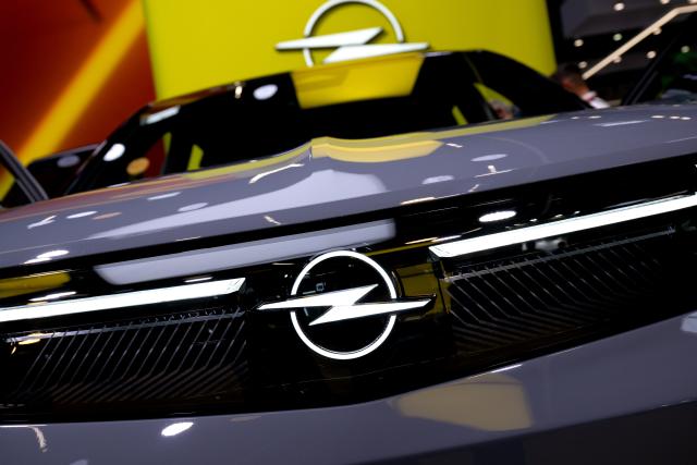 FILED - 10 September 2025, Bavaria, Munich: FILE PHOTO - The Opel logo is displayed on a vehicle at the Opel booth during the International Motor Show (IAA Mobility). Photo: Sven Hoppe/dpa