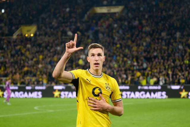 08 May 2026, Dortmund: Borussia Dortmund's Nico Schlotterbeck celebrates scoring his side's second goal during the German Bundesliga soccer match between Borussia Dortmund and Eintracht Frankfurt at the Signal Iduna Park. Photo: Bernd Thissen/dpa - IMPORTANT NOTICE: DFL and DFB regulations prohibit any use of photographs as image sequences and/or quasi-video.