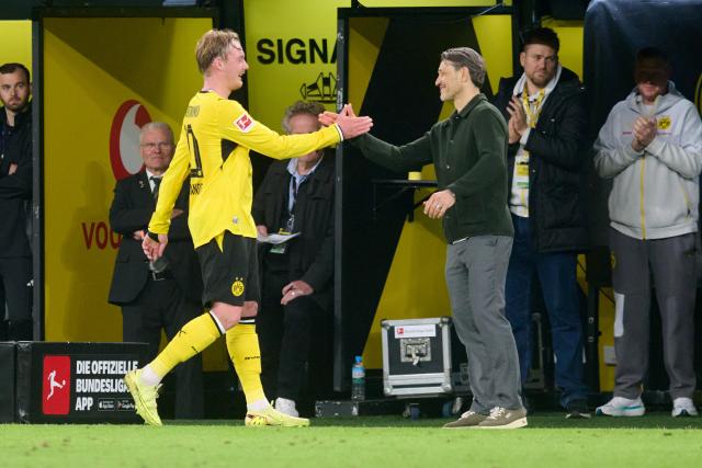 08 May 2026, Dortmund: Borussia Dortmund's Julian Brandt is substituted by coach Niko Kovac during the German Bundesliga soccer match between Borussia Dortmund and Eintracht Frankfurt at the Signal Iduna Park. Photo: Bernd Thissen/dpa - IMPORTANT NOTICE: DFL and DFB regulations prohibit any use of photographs as image sequences and/or quasi-video.