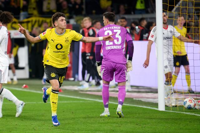 08 May 2026, Dortmund: Borussia Dortmund's Samuele Inacio celebrates scoring his side's third goal during the German Bundesliga soccer match between Borussia Dortmund and Eintracht Frankfurt at the Signal Iduna Park. Photo: Bernd Thissen/dpa - IMPORTANT NOTICE: DFL and DFB regulations prohibit any use of photographs as image sequences and/or quasi-video.