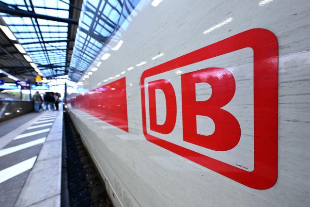 FILED - 16 November 2023, Thuringia, Erfurt: FILE PHOTO - The DB logo on an ICE train at Erfurt Central Station. Photo: Martin Schutt/dpa