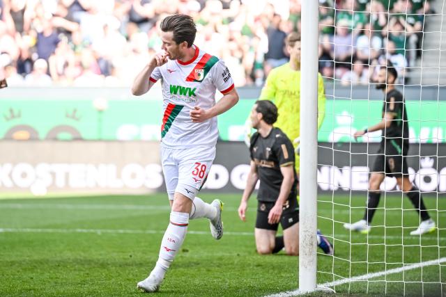 09 May 2026, Bavaria, Augsburg: Augsburg's Michael Gregoritsch celebrates scoring his side's first goal during the German Bundesliga soccer match between FC Augsburg and Borussia Moenchengladbach at the WWK-Arena. Photo: Harry Langer/dpa - IMPORTANT NOTICE: DFL and DFB regulations prohibit any use of photographs as image sequences and/or quasi-video.