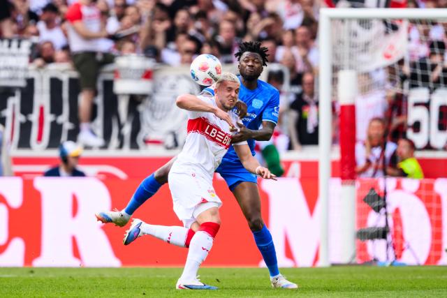 09 May 2026, Stuttgart: Stuttgart's Ermedin Demirovic (L) in action against Bayer Leverkusen)'s Edmond Tapsoba during the German Bundesliga soccer match between VfB Stuttgart and Bayer 04 Leverkusen at the MHPArena. Photo: Tom Weller/dpa - IMPORTANT NOTICE: DFL and DFB regulations prohibit any use of photographs as image sequences and/or quasi-video.