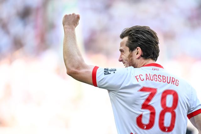 09 May 2026, Bavaria, Augsburg: Augsburg's Michael Gregoritsch celebrates scoring his side's first goal during the German Bundesliga soccer match between FC Augsburg and Borussia Moenchengladbach at the WWK-Arena. Photo: Harry Langer/dpa - IMPORTANT NOTICE: DFL and DFB regulations prohibit any use of photographs as image sequences and/or quasi-video.
